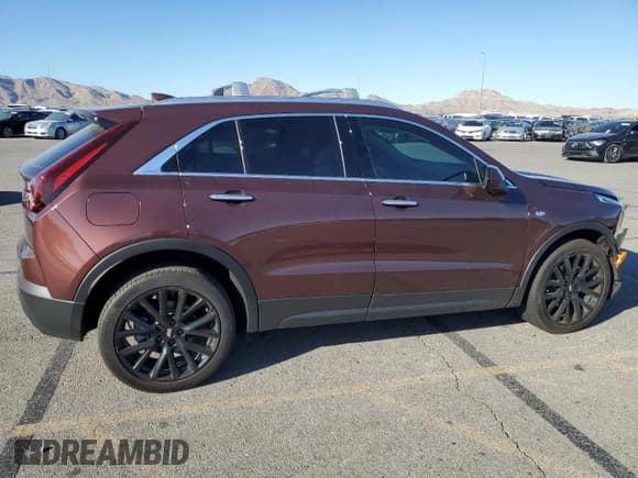 ✅ 2023 Cadillac XT4 AWD Luxury • VIN: 1GYFZBR42PF107893 • Lot: 74989124. Listed on Copart with 9,579 mi. Free auction sales archive from the USA and detailed vehicle history report at DreamBid. Image 3.
