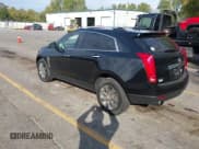 ✅ 2015 Cadillac SRX Luxury Collection • VIN: 3GYFNEE34FS560658 • Lot: 43415308. Listed on IAAI with 150,873 mi. Free auction sales archive from the USA and detailed vehicle history report at DreamBid. Image 3.