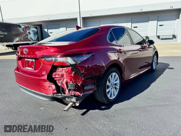 2022 Toyota Camry LE с VIN 4T1C11BK2NU059674, выставлен на аукционе Copart как лот 86409205 с пробегом 86 145 миль миль и Списание • Salvage title. История ставок и продаж доступна на DreamBid. Изображение 4.