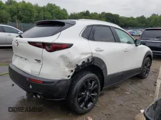 ✅ 2022 Mazda CX-30 2.5 Turbo • VIN: 3MVDMBAY3NM444241 • Lot: 64459924. Wystawiony na Copart z przebiegiem 10 865 mil. Bezpłatny archiwum sprzedaży aukcyjnych z USA i szczegółowy raport historii pojazdu na DreamBid. Zdjęcie 3.