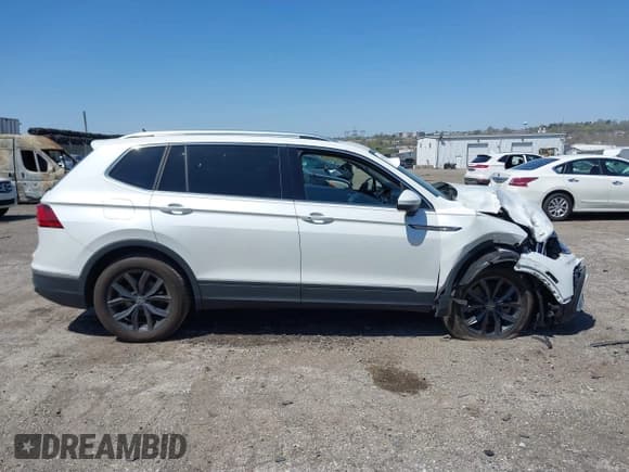 ✅ 2023 Volkswagen Tiguan SE • VIN: 3VVMB7AX4PM128427 • Lot: 42054477. Listed on IAAI with 29,731 mi. Free auction sales archive from the USA and detailed vehicle history report at DreamBid. Image 12.