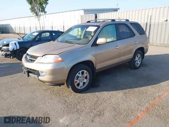 ✅ 2001 Acura MDX Touring • VIN: 2HNYD18831H514620 • Lot: 43523973. Wystawiony na IAAI z przebiegiem 56 269 mil. Bezpłatny archiwum sprzedaży aukcyjnych z USA i szczegółowy raport historii pojazdu na DreamBid. Zdjęcie 2.