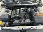 ✅ 2009 Dodge Challenger SE • VIN: 2B3LJ44VX9H623305 • Lot: 77859084. Wystawiony na Copart z przebiegiem 137 341 mil. Bezpłatny archiwum sprzedaży aukcyjnych z USA i szczegółowy raport historii pojazdu na DreamBid. Zdjęcie 7.