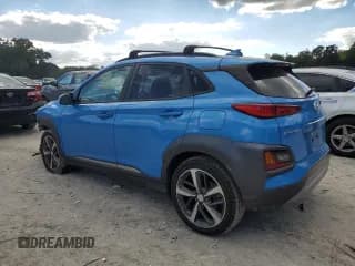 ✅ 2021 Hyundai Kona Ultimate • VIN: KM8K53A57MU617847 • Лот: 86987525. Опубликован ранее на Copart с пробегом 52 069 миль. Бесплатный доступ к архиву аукционных продаж из США и подробный отчёт об истории автомобиля на DreamBid. Изображение 2.
