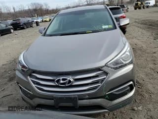 ✅ 2017 Hyundai Santa Fe 2.4L • VIN: 5NMZTDLB8HH018714 • Лот: 39317163. Опубликован ранее на Copart с пробегом 121 500 миль. Бесплатный доступ к архиву аукционных продаж из США и подробный отчёт об истории автомобиля на DreamBid. Изображение 5.