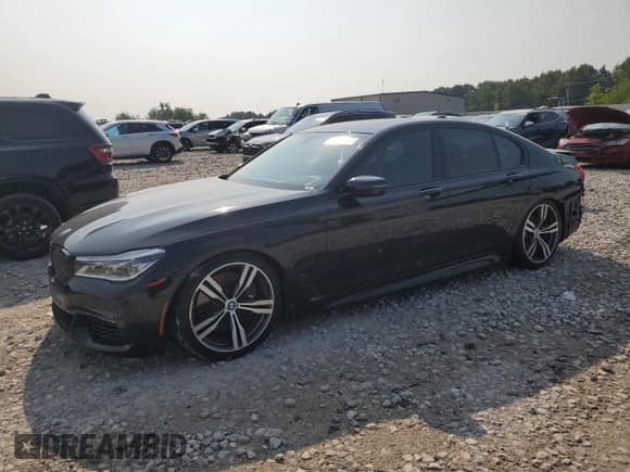 ✅ 2016 BMW 7 Series 750i xDrive • VIN: WBA7B0C59GGF92290 • Lot: 67015855. Wystawiony na Copart z przebiegiem 74 376 mil. Bezpłatny archiwum sprzedaży aukcyjnych z USA i szczegółowy raport historii pojazdu na DreamBid. Zdjęcie 1.