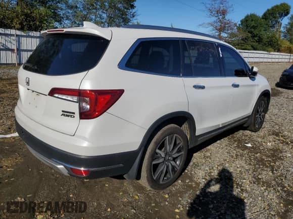 ✅ 2022 Honda Pilot Touring 7-Passenger • VIN: 5FNYF6H60NB060737 • Lot: 85911665. Listed on Copart with Not provided. Free auction sales archive from the USA and detailed vehicle history report at DreamBid. Image 3.