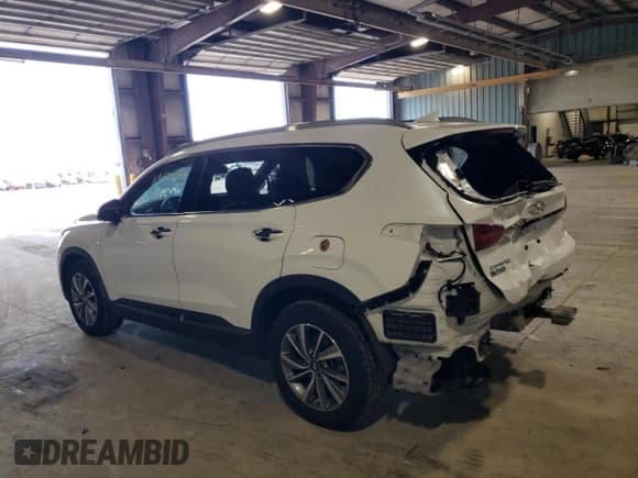 ✅ 2020 Hyundai Santa Fe Limited • VIN: 5NMS5CAD4LH214152 • Lot: 69690933. Wystawiony na Copart z przebiegiem 106 450 mil. Bezpłatny archiwum sprzedaży aukcyjnych z USA i szczegółowy raport historii pojazdu na DreamBid. Zdjęcie 2.