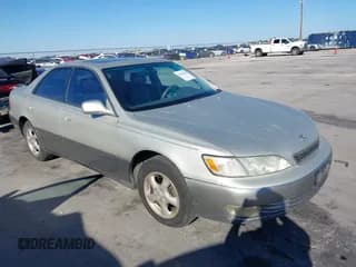 ✅ 1998 Lexus ES 300 • VIN: JT8BF28GXW5021341 • Lot: 43626230. Listed on IAAI with 379,537 mi. Free auction sales archive from the USA and detailed vehicle history report at DreamBid. Image 1.