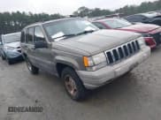✅ 1998 Jeep Grand Cherokee Laredo • VIN: 1J4GZ58S2WC249411 • Lot: 43873044. Listed on IAAI with 141,015 mi. Free auction sales archive from the USA and detailed vehicle history report at DreamBid. Image 1.
