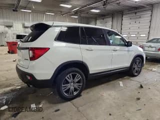 ✅ 2021 Honda Passport EX-L • VIN: 5FNYF8H52MB003912 • Lot: 89476825. Wystawiony na Copart z przebiegiem 65 306 mil. Bezpłatny archiwum sprzedaży aukcyjnych z USA i szczegółowy raport historii pojazdu na DreamBid. Zdjęcie 3.