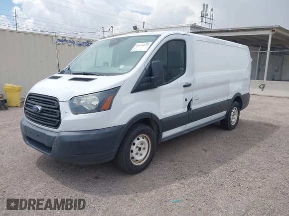 ✅ 2015 Ford Transit Cargo • VIN: 1FTNE1YMXFKB14248 • Lot: 42478512. Listed on IAAI with 264,308 mi. Free auction sales archive from the USA and detailed vehicle history report at DreamBid. Image 18.