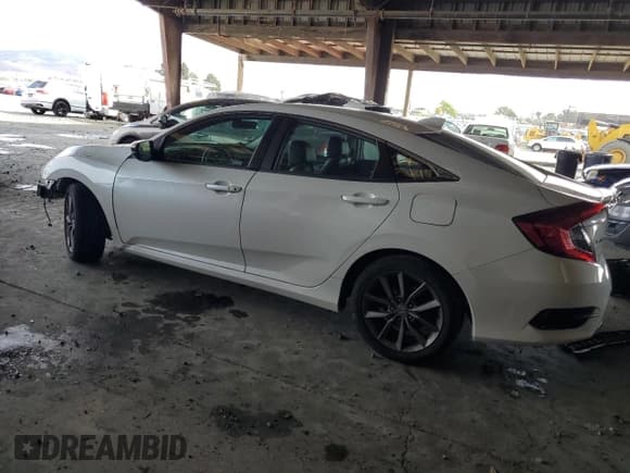 ✅ 2020 Honda Civic EX-L • VIN: 19XFC1F70LE218494 • Lot: 84817515. Listed on Copart with 62,886 mi. Free auction sales archive from the USA and detailed vehicle history report at DreamBid. Image 2.