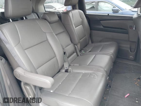 ✅ 2015 Honda Odyssey Touring Elite • VIN: 5FNRL5H93FB115023 • Lot: 43558983. Listed on IAAI with 98,221 mi. Free auction sales archive from the USA and detailed vehicle history report at DreamBid. Image 8.