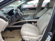 ✅ 2016 Lincoln MKZ • VIN: 3LN6L2J95GR616342 • Lot: 67052385. Listed on Copart with 100,184 mi. Free auction sales archive from the USA and detailed vehicle history report at DreamBid. Image 7.