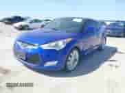 2012 Hyundai Veloster w/Gray Int z VIN KMHTC6AD5CU077688, wystawiony jako IAAI lot #42856328 z przebiegiem 54 849 mil mil oraz . Historia ofert i sprzedaży dostępna na DreamBid. Obrazek 2.