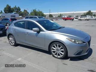 ✅ 2014 Mazda 3 i Grand Touring • VIN: JM1BM1M72E1112990 • Lot: 42485882. Listed on IAAI with 271,237 mi. Free auction sales archive from the USA and detailed vehicle history report at DreamBid. Image 1.