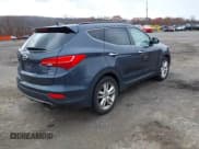 ✅ 2014 Hyundai Santa Fe • VIN: 5XYZWDLA8EG174613 • Лот: 43680209. Опубликован ранее на IAAI с пробегом 269 810 миль. Бесплатный доступ к архиву аукционных продаж из США и подробный отчёт об истории автомобиля на DreamBid. Изображение 4.
