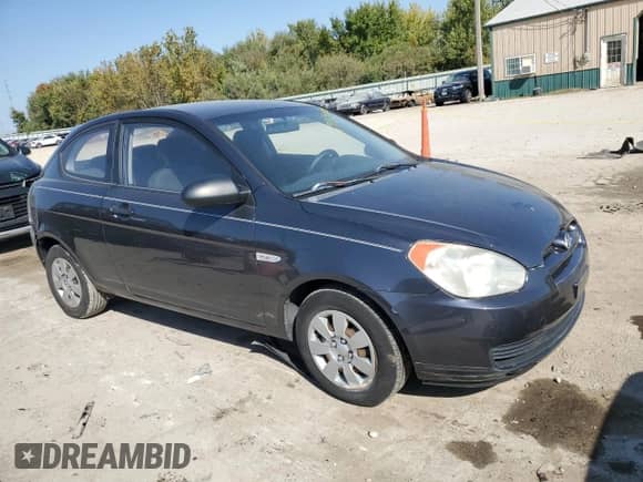 2007 Hyundai Accent GS with VIN KMHCM36CX7U029556, listed as a Copart auction lot 74939084 with 154,806 mi miles and Salvage title. Bid and sale history available at DreamBid. Image 4.