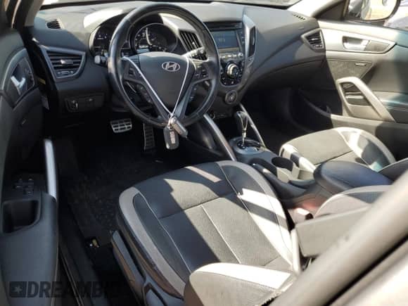 2015 Hyundai Veloster Turbo z VIN KMHTC6AE4FU226654, wystawiony jako Copart lot #66722554 z przebiegiem 69 620 mil mil oraz Szkoda całkowita • Salvage title. Historia ofert i sprzedaży dostępna na DreamBid. Obrazek 8.