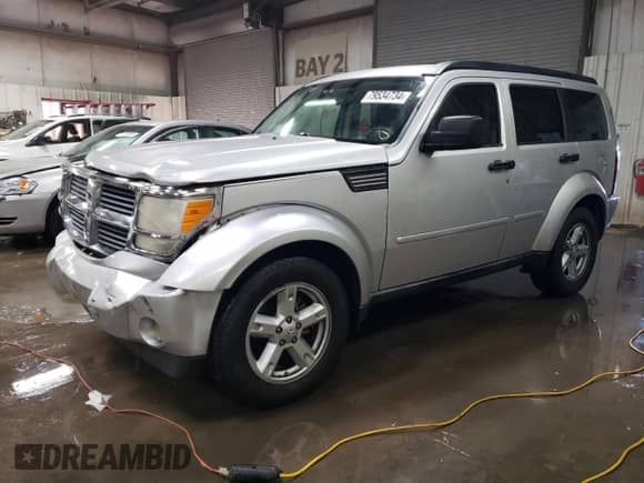 2008 Dodge Nitro SXT с VIN 1D8GU28KX8W129037, выставлен на аукционе Copart как лот 79534734 с пробегом 162 073 миль миль и Списание • Salvage title. История ставок и продаж доступна на DreamBid. Изображение 1.