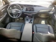 ✅ 2020 Cadillac XT4 FWD Sport • VIN: 1GYFZER46LF050447 • Лот: 61822375. Опубликован ранее на Copart с пробегом 91 129 миль. Бесплатный доступ к архиву аукционных продаж из США и подробный отчёт об истории автомобиля на DreamBid. Изображение 8.