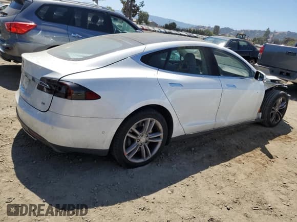✅ 2014 Tesla Model S 60 • VIN: 5YJSA1H11EFP57345 • Lot: 70719985. Listed on Copart with 149,484 mi. Free auction sales archive from the USA and detailed vehicle history report at DreamBid. Image 3.