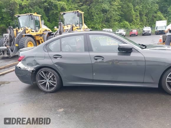 2022 BMW 3 Series 330i xDrive with VIN WBA5R7C05NFM16689, listed as a IAAI auction lot 42530938 with 56,777 mi miles and . Bid and sale history available at DreamBid. Image 13.