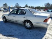 ✅ 1997 Lexus LS 400 • VIN: JT8BH28F2V0096905 • Лот: 46050635. Опубликован ранее на Copart с пробегом 252 171 миль. Бесплатный доступ к архиву аукционных продаж из США и подробный отчёт об истории автомобиля на DreamBid. Изображение 2.