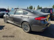 ✅ 2017 Ford Fusion Hybrid Titanium • VIN: 3FA6P0RUXHR260967 • Lot: 90726665. Wystawiony na Copart z przebiegiem 250 880 mil. Bezpłatny archiwum sprzedaży aukcyjnych z USA i szczegółowy raport historii pojazdu na DreamBid. Zdjęcie 2.