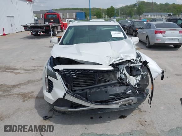 ✅ 2022 Cadillac XT4 FWD Premium Luxury • VIN: 1GYFZCR44NF144494 • Lot: 42072181. Listed on IAAI with 41,891 mi. Free auction sales archive from the USA and detailed vehicle history report at DreamBid. Image 12.