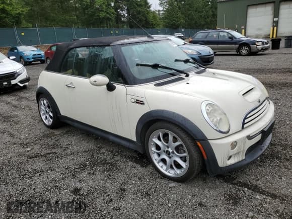 ✅ 2007 MINI Convertible S • VIN: WMWRH33567TL94103 • Lot: 59721735. Listed on Copart with 58,559 mi. Free auction sales archive from the USA and detailed vehicle history report at DreamBid. Image 4.