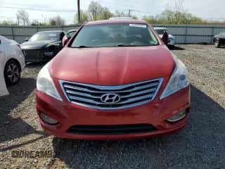 2014 Hyundai Azera Limited z VIN KMHFH4JG5EA385767, wystawiony jako Copart lot #54288435 z przebiegiem 138 477 mil mil oraz Czysty tytuł • Clean title. Historia ofert i sprzedaży dostępna na DreamBid. Obrazek 5.