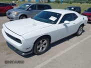✅ 2013 Dodge Challenger SXT • VIN: 2C3CDYAG6DH604038 • Lot: 42606393. Listed on IAAI with 149,075 mi. Free auction sales archive from the USA and detailed vehicle history report at DreamBid. Image 2.