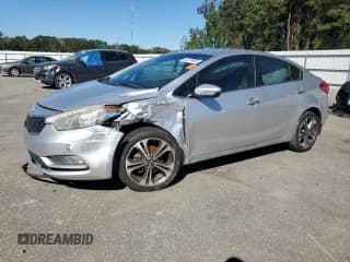 ✅ 2014 Kia Forte EX • VIN: KNAFX4A86E5078596 • Lot: 82378805. Listed on Copart with 165,181 mi. Free auction sales archive from the USA and detailed vehicle history report at DreamBid. Image 1.