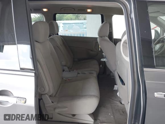 ✅ 2015 Nissan Quest SV • VIN: JN8AE2KP5F9130604 • Лот: 42450583. Опубликован ранее на IAAI с пробегом 206 904 миль. Бесплатный доступ к архиву аукционных продаж из США и подробный отчёт об истории автомобиля на DreamBid. Изображение 8.