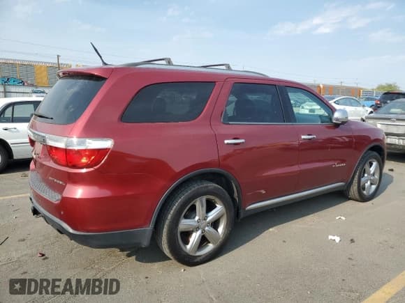 ✅ 2013 Dodge Durango Citadel • VIN: 1C4SDJET1DC688231 • Lot: 71877465. Listed on Copart with 149,812 mi. Free auction sales archive from the USA and detailed vehicle history report at DreamBid. Image 3.