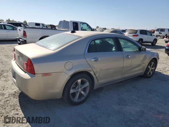 ✅ 2012 Chevrolet Malibu 1LT • VIN: 1G1ZC5E05CF112131 • Lot: 64055834. Listed on Copart with 142,432 mi. Free auction sales archive from the USA and detailed vehicle history report at DreamBid. Image 3.
