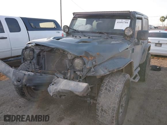 ✅ 2014 Jeep Wrangler Sport • VIN: 1C4AJWAG0EL326774 • Лот: 41691784. Опубликован ранее на IAAI с пробегом 98 696 миль. Бесплатный доступ к архиву аукционных продаж из США и подробный отчёт об истории автомобиля на DreamBid. Изображение 18.