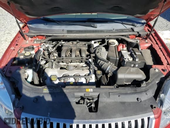 ✅ 2009 Mercury Sable Premier • VIN: 1MEHM42W59G628722 • Lot: 79642074. Wystawiony na Copart z przebiegiem 80 369 mil. Bezpłatny archiwum sprzedaży aukcyjnych z USA i szczegółowy raport historii pojazdu na DreamBid. Zdjęcie 12.