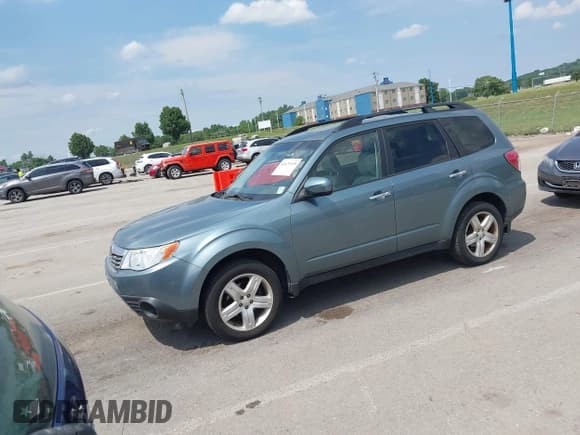 ✅ 2009 Subaru Forester X • VIN: JF2SH63609H766458 • Lot: 42621929. Listed on IAAI with 152,235 mi. Free auction sales archive from the USA and detailed vehicle history report at DreamBid. Image 2.