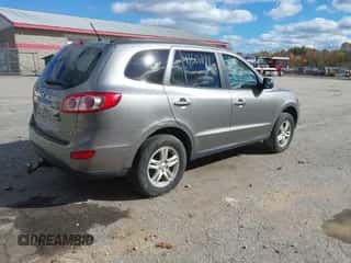 2011 Hyundai Santa Fe GLS z VIN 5XYZGDAB3BG022274, wystawiony jako IAAI lot #43507199 z przebiegiem 219 067 mil mil oraz . Historia ofert i sprzedaży dostępna na DreamBid. Obrazek 4.