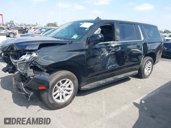 ✅ 2023 Chevrolet Suburban LS • VIN: 1GNSCBKD2PR245004 • Lot: 43312979. Wystawiony na IAAI z przebiegiem 148 253 mil. Bezpłatny archiwum sprzedaży aukcyjnych z USA i szczegółowy raport historii pojazdu na DreamBid. Zdjęcie 2.