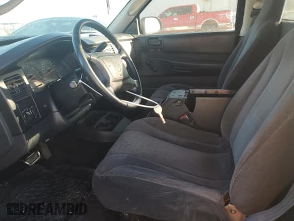 ✅ 2003 Dodge Dakota • VIN: 1D7FL16X93S146486 • Lot: 85340554. Wystawiony na Copart z przebiegiem 195 260 mil. Bezpłatny archiwum sprzedaży aukcyjnych z USA i szczegółowy raport historii pojazdu na DreamBid. Zdjęcie 7.