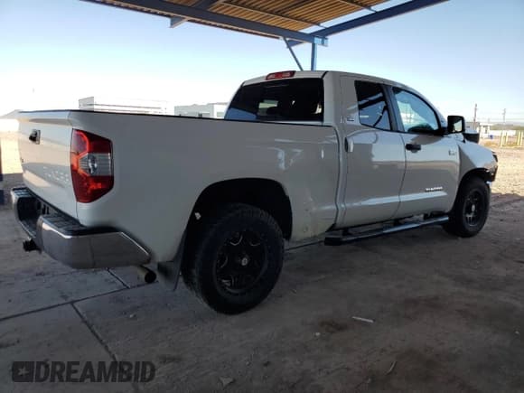 ✅ 2014 Toyota Tundra SR • VIN: 5TFUW5F13EX341291 • Lot: 62582045. Listed on Copart with 263,297 mi. Free auction sales archive from the USA and detailed vehicle history report at DreamBid. Image 3.