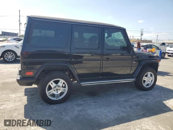 ✅ 2003 Mercedes-Benz G 500 • VIN: WDCYR49E43X135065 • Лот: 71833684. Опубликован ранее на Copart с пробегом 171 089 миль. Бесплатный доступ к архиву аукционных продаж из США и подробный отчёт об истории автомобиля на DreamBid. Изображение 3.