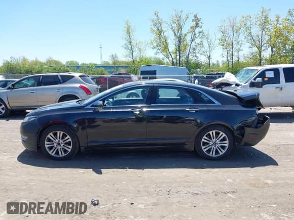 ✅ 2015 Lincoln MKZ • VIN: 3LN6L2J96FR625761 • Lot: 42235387. Wystawiony na IAAI z przebiegiem 132 183 mil. Bezpłatny archiwum sprzedaży aukcyjnych z USA i szczegółowy raport historii pojazdu na DreamBid. Zdjęcie 14.