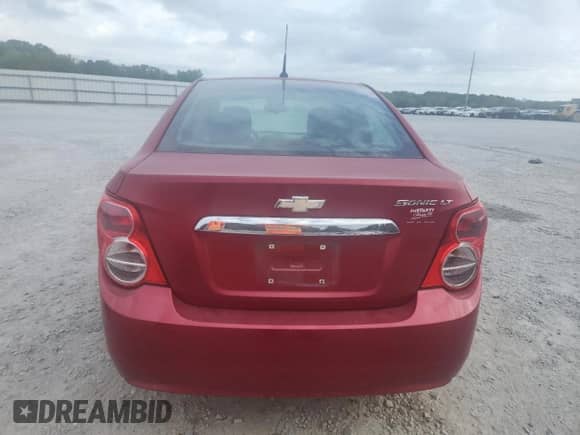 2013 Chevrolet Sonic LT с VIN 1G1JC5SHXD4246542, выставлен на аукционе Copart как лот 82243535 с пробегом 108 780 миль миль и Списание • Salvage title. История ставок и продаж доступна на DreamBid. Изображение 6.