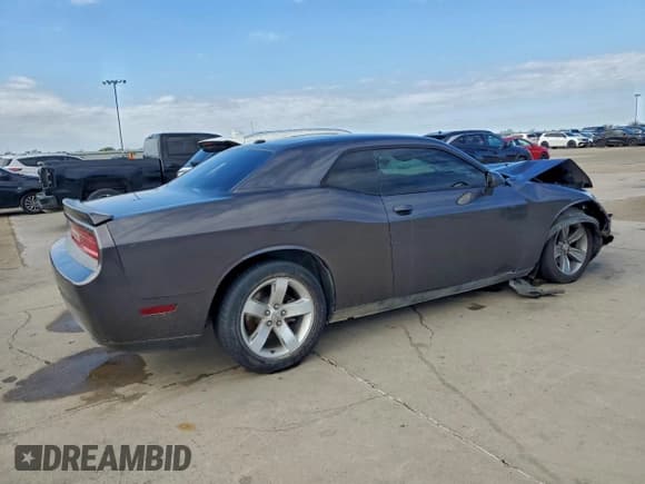 ✅ 2013 Dodge Challenger SXT • VIN: 2C3CDYAG8DH512011 • Lot: 93937345. Wystawiony na Copart z przebiegiem 125 451 mil. Bezpłatny archiwum sprzedaży aukcyjnych z USA i szczegółowy raport historii pojazdu na DreamBid. Zdjęcie 3.