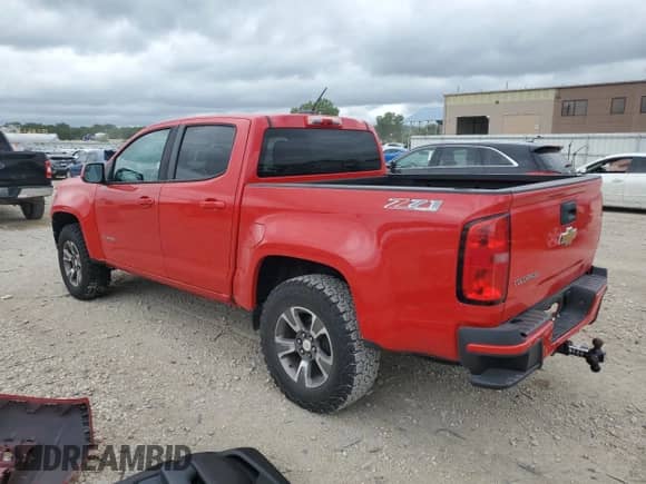 2015 Chevrolet Colorado 4WD Z71 with VIN 1GCGTCE37F1178419, listed as a Copart auction lot 64413185 with 221,487 mi miles and Salvage title. Bid and sale history available at DreamBid. Image 2.